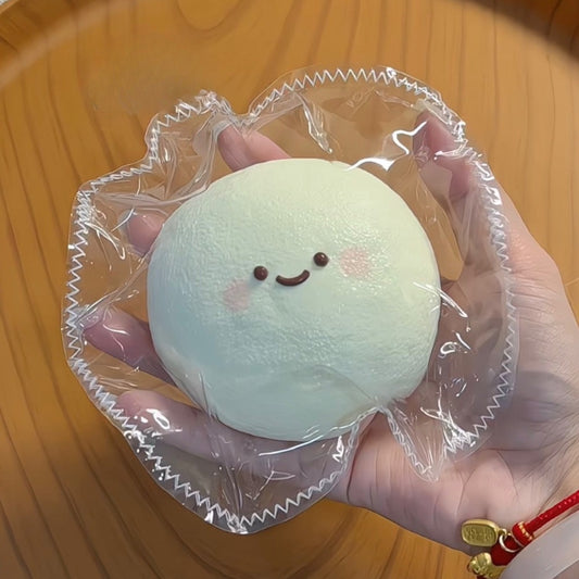 Milky mochi daifuku water squishy toy with a smiling face